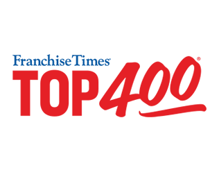 Logo of Franchise Times Top 400, showcasing Franchise Times in blue and TOP 400 in bold red with a red underline, symbolizing excellence. Highlighting Unishippers franchise ownership, this emblem represents a hallmark of success.