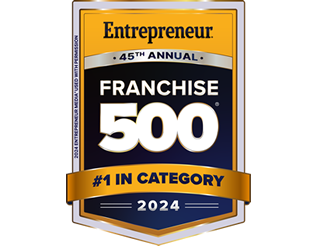 Image of a shield-shaped badge featuring the words Entrepreneur 45th Annual Franchise 500 in bold letters. Showcasing Unishippers Franchise Ownership, it proudly states #1 in Category 2024 at the bottom, highlighted by a striking blue and gold color scheme.