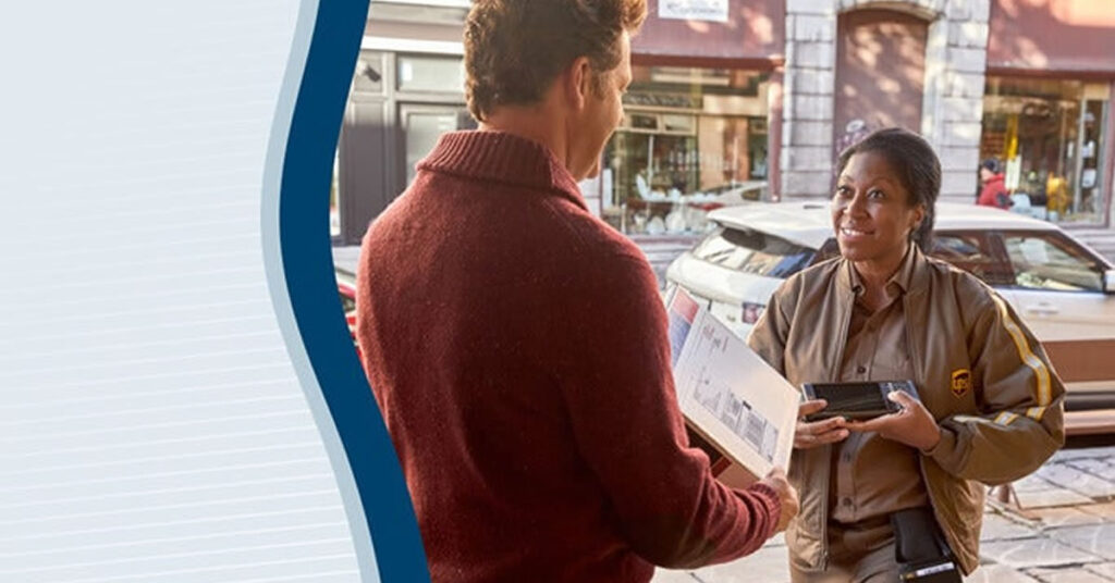 A delivery driver hands a package to a man outside a building on a city street. The driver, serving MB Shipping Customers, holds a handheld device and smiles while the man accepts the package. Cars and storefronts are visible in the background.