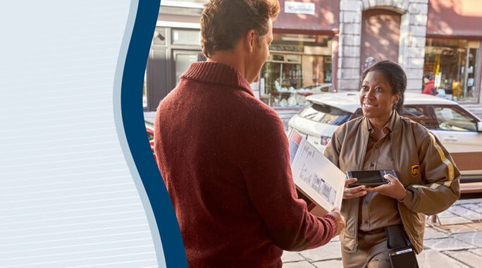 A delivery driver hands a package to a man outside a building on a city street. The driver, serving MB Shipping Customers, holds a handheld device and smiles while the man accepts the package. Cars and storefronts are visible in the background.